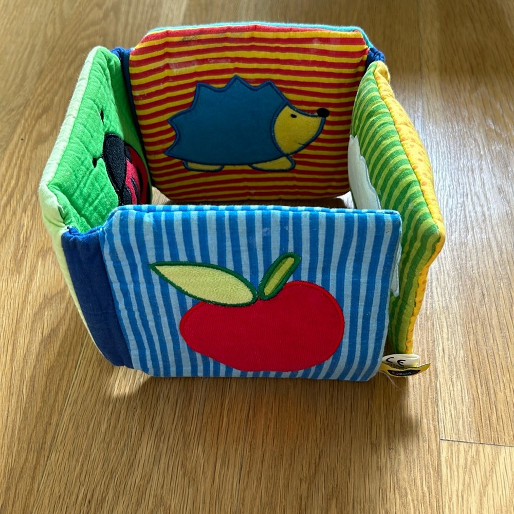 Picture book with rattle in fabric, made in Germany!